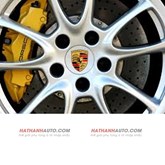 Lô gô bánh xe Porsche Cayenne V6 Tiptronic năm 2011